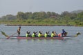 Rowboats for intergroup competitions on a quiet river downstream.