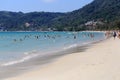 Rowds of tourists vacation on a beach during their Christmas hol