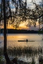 Rower paddling down pond in Payne`s Prairie in Florida Royalty Free Stock Photo