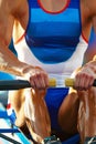 Rower s muscles flexing in close up power stroke displaying strength olympic sport concept