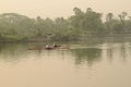 Rowers rowing boats in the morning at rabindra sarobar lake, kolkata