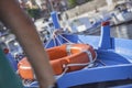 Rowing boat detail with life buoy  3 Royalty Free Stock Photo