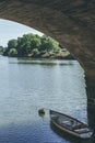 Rowing boat floating near the Thames riverside in London Royalty Free Stock Photo