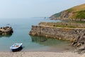 Rowing boat moored in tiny harbour Royalty Free Stock Photo