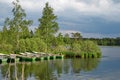 Rowing boats at a lake with birches