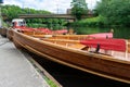 Rowing boats lined up on the Wear river in the city centre of Durham Royalty Free Stock Photo