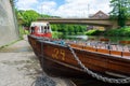 Rowing boats lined up on the Wear river in the city centre of Durham Royalty Free Stock Photo