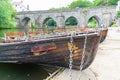 Rowing boats lined up on the Wear river in the city centre of Durham