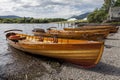 Rowing boats on shore of Derwent Water, Keswick. Royalty Free Stock Photo