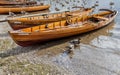 Rowing boats on shore of Derwent Water, Keswick. Royalty Free Stock Photo