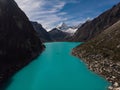 Rowing paddle boat on blue turquoise alpine mountain lake Laguna Paron in Caraz Huaraz Ancash Cordillera Blanca Peru Royalty Free Stock Photo