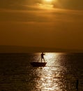 Rowing in sunset 4 Royalty Free Stock Photo