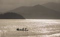 Rowing at sunset Royalty Free Stock Photo