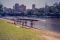 The rowing team prepare to start with their boat on the bank of Yarra river. 4PM, 25 February, 2017 Royalty Free Stock Photo