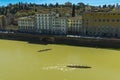 Rowing training on the Arno river in Florence, Italy