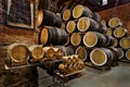 Rows of alcoholic drums in stock. Distillery. Cognac, whiskey, wine, brandy. Alcohol in barrels