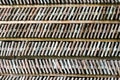 Rows of arranged bricks on a wood shelf. Royalty Free Stock Photo