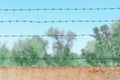 Rows of barbed wire over a wall Royalty Free Stock Photo
