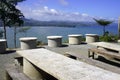 Rows of benches made of cast cement in the rest area Royalty Free Stock Photo