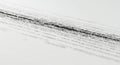 Rows of binary code, consisting of ones and zeros, are printed on a white surface. The Royalty Free Stock Photo