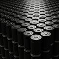 Rows of black cylindrical batteries arranged in a dense grid. Each battery is uniform in Royalty Free Stock Photo