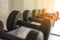 Rows of black dumbbell set on rack in the gym. Health care concept Royalty Free Stock Photo