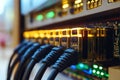 Rows of black and yellow Ethernet cables plugged into server racks representing organized network management and efficient data