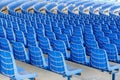 Rows of blue plastic chairs on a metal base  in rows around the circle in the hall for business presentations Royalty Free Stock Photo