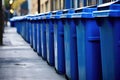 rows of blue recycling bins in a row