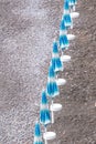 Rows of blue and white parasols and sunbeds on the beach at Atrani on the Amalfi Coast, Italy. Royalty Free Stock Photo