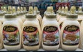 Rows of bottles of thousand island salad dressing and spicy mayonnaise Royalty Free Stock Photo