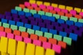 Rows of brightly colored pencil erasers lined up in an OCD order