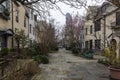 Rows of brownstone apartment buildings in Center City with windows, stoops and plants in Pennsylvania