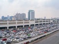 Rows of busy cars corporate parking lots in shopping malls in urban city. Full space design area in transportation concept.