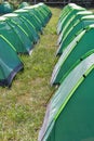 Rows of camping tents on campground.