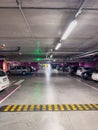 Budva, Montenegro - 09 august 2023: Rows of cars stand in a lighted underground parking