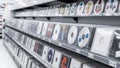 Rows of CDs and DVDs on shelves in a retail store display Royalty Free Stock Photo