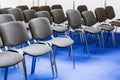 Rows of chairs at a conference