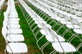 Rows of chairs form a beautiful pattern on the grass land Royalty Free Stock Photo