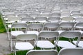 Rows of chairs form a beautiful pattern on the grass land Royalty Free Stock Photo