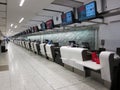 Rows of check in counters at the airport Royalty Free Stock Photo