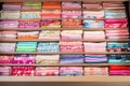 rows of childrens wear pattern papers in drawer