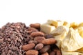 Rows of Chocolate Nibs Cocoa Beans and Cocoa Butter on a White Background
