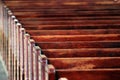 Rows of church benches. Polished wooden pews. Blurred focus Royalty Free Stock Photo