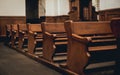 Rows of church benches. Selective focus. Beautiful background. Royalty Free Stock Photo