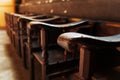 Rows of Church benches with sunlight close-up Royalty Free Stock Photo