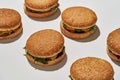 Rows with classic tasty and appetizing burgers