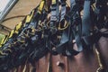 Rows of climbing safety ropes and carabiners and helmets Royalty Free Stock Photo