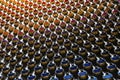 Rows of color paint spray cans placed on a black wall Royalty Free Stock Photo