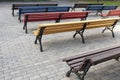 Rows of colored benches in the park